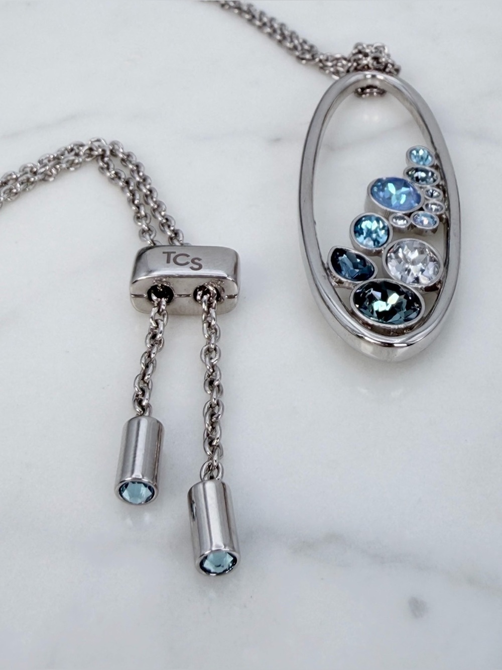 Touchstone Crystal Swarovski Rolling In Necklace Pendant Adjustable Blue Silver